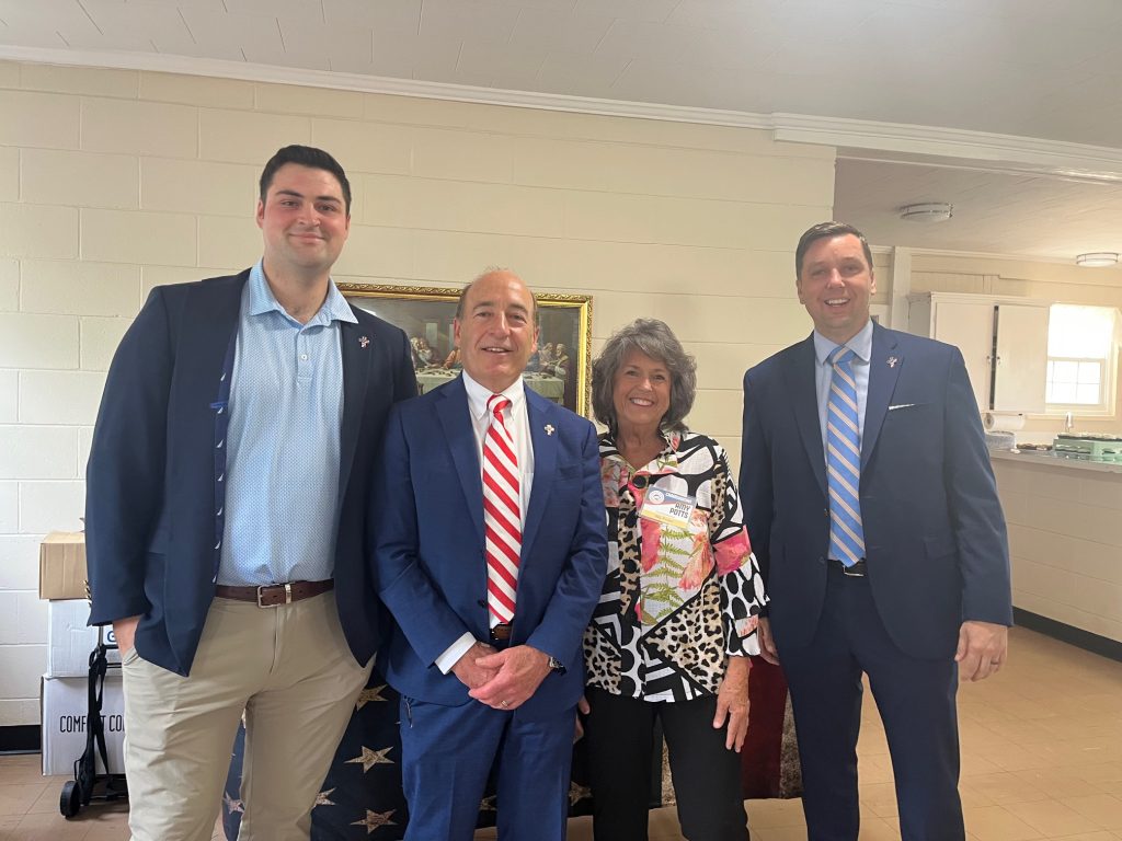 Mark Lynch and staffers with Saluda Chair, Amy Potts